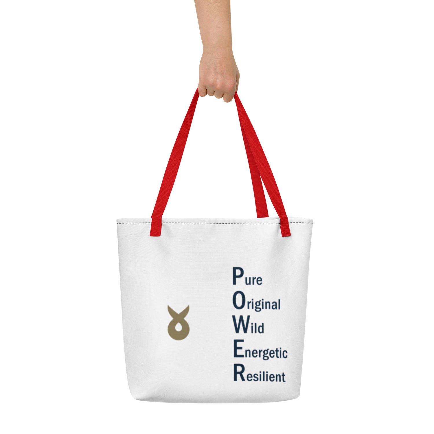 White tote bag with red handles, featuring the word "POWER" written vertically as an acronym (Pure, Original, Wild, Energetic, Resilient) and a gold Ballstad logo beside the text, held by a hand against a plain white background.