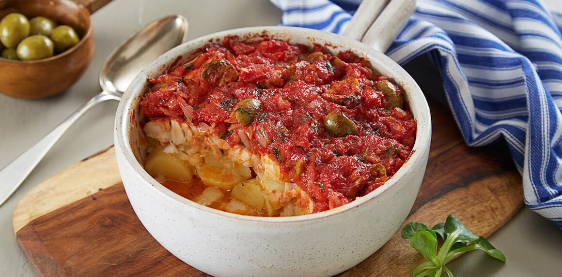 Oven-baked cod with tomato and basil