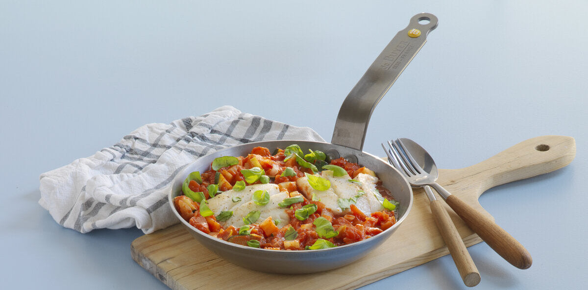 Tomato saithe stew with vegetables